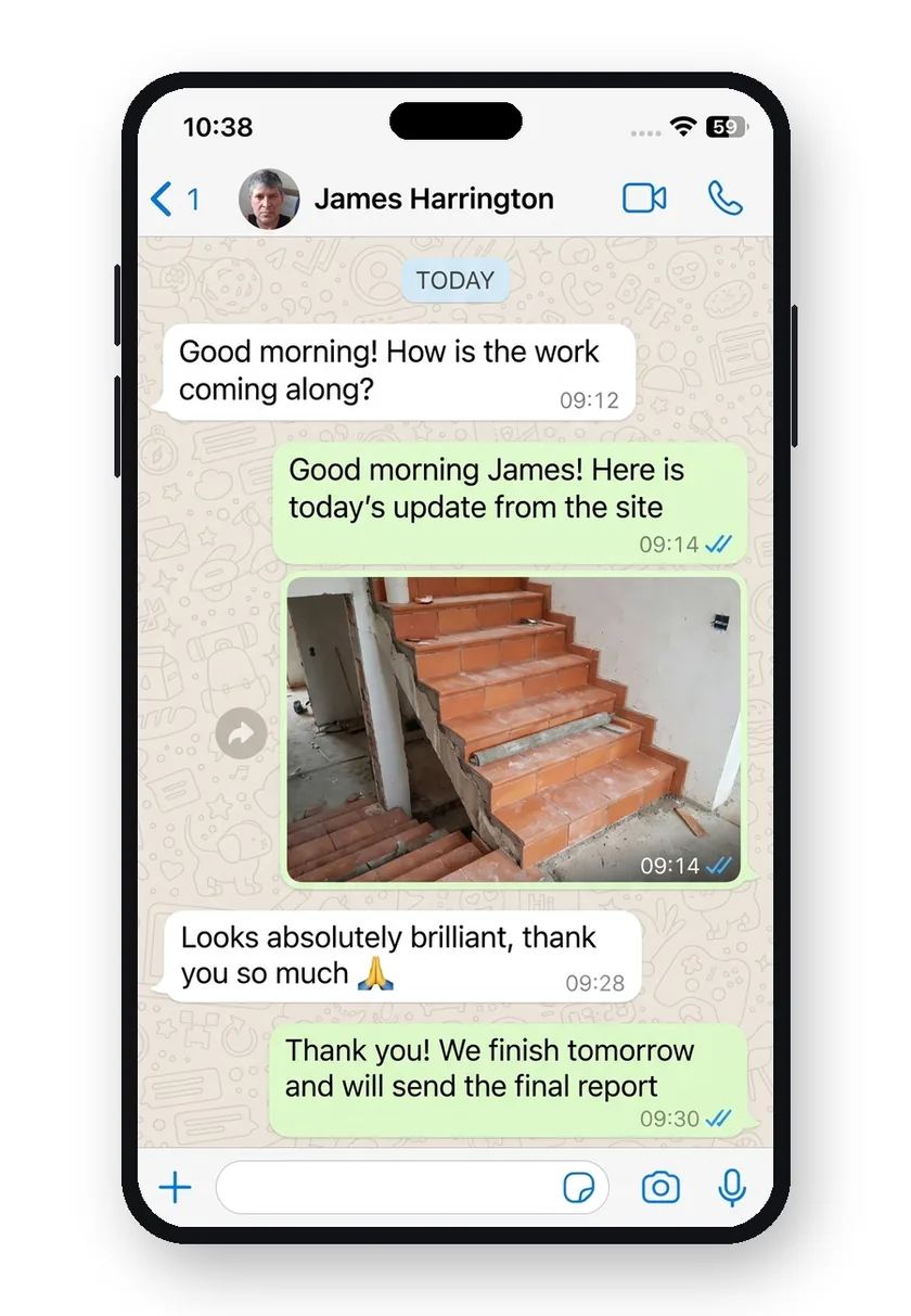 Phone showing a WhatsApp chat with project photos